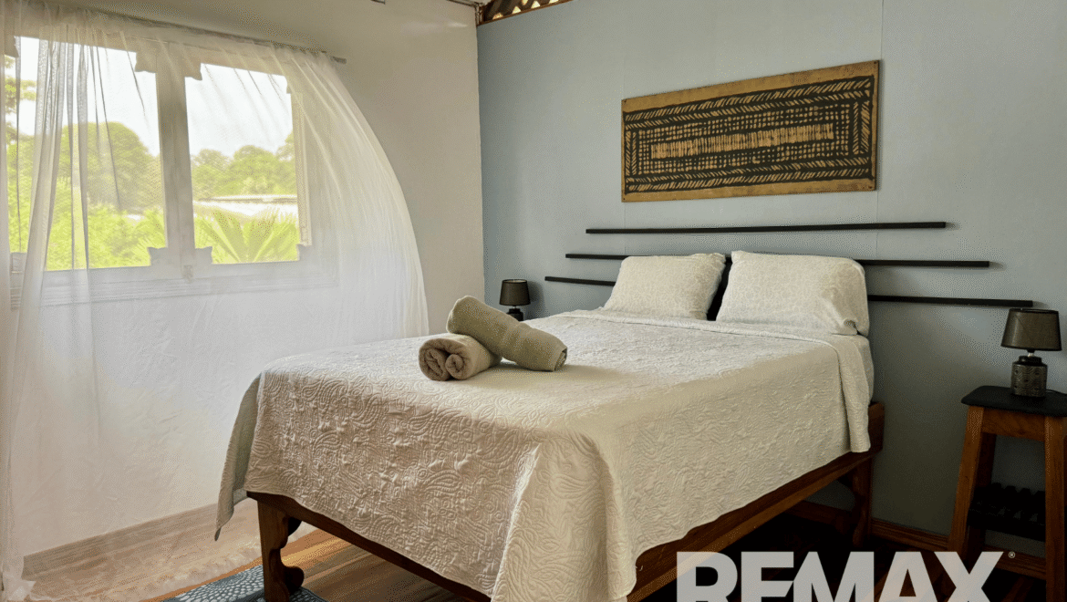 Boutique Caribbean Hotel Brisas del Caribe Casita bedroom with 1 Queen Bed