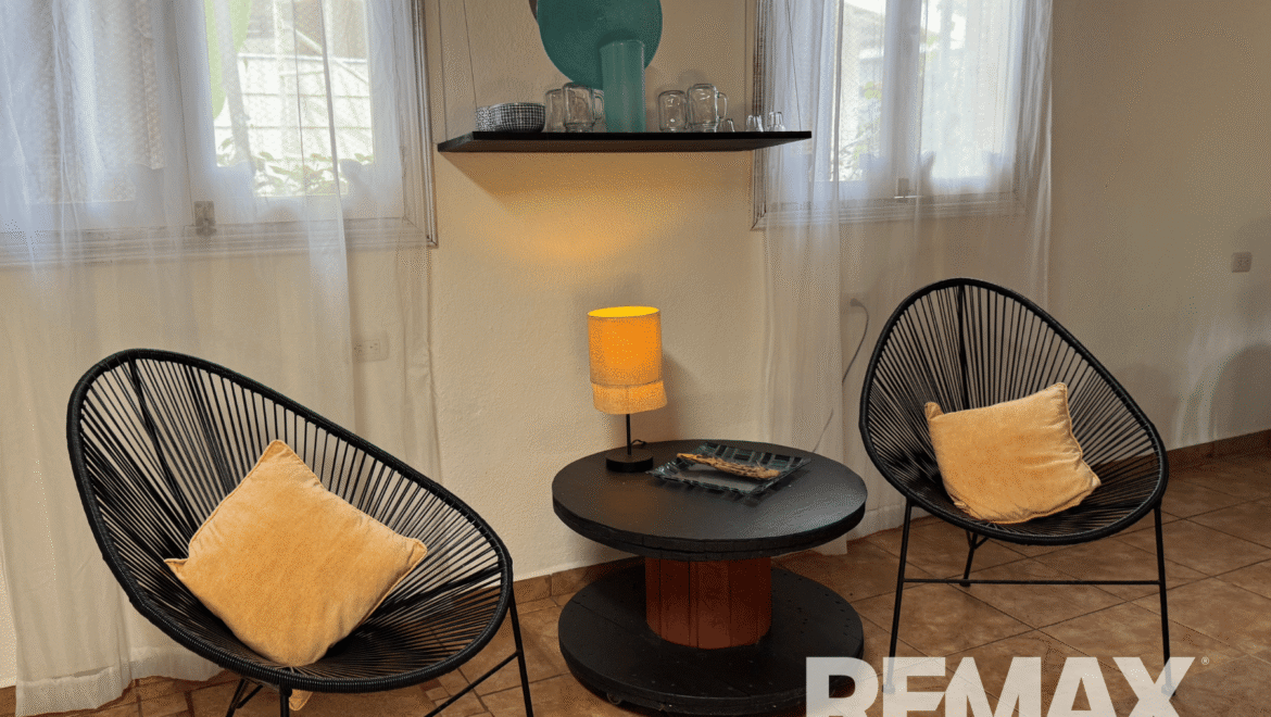Boutique Caribbean Hotel - Brisas del Caribe Casita living room chairs with yellow cushions